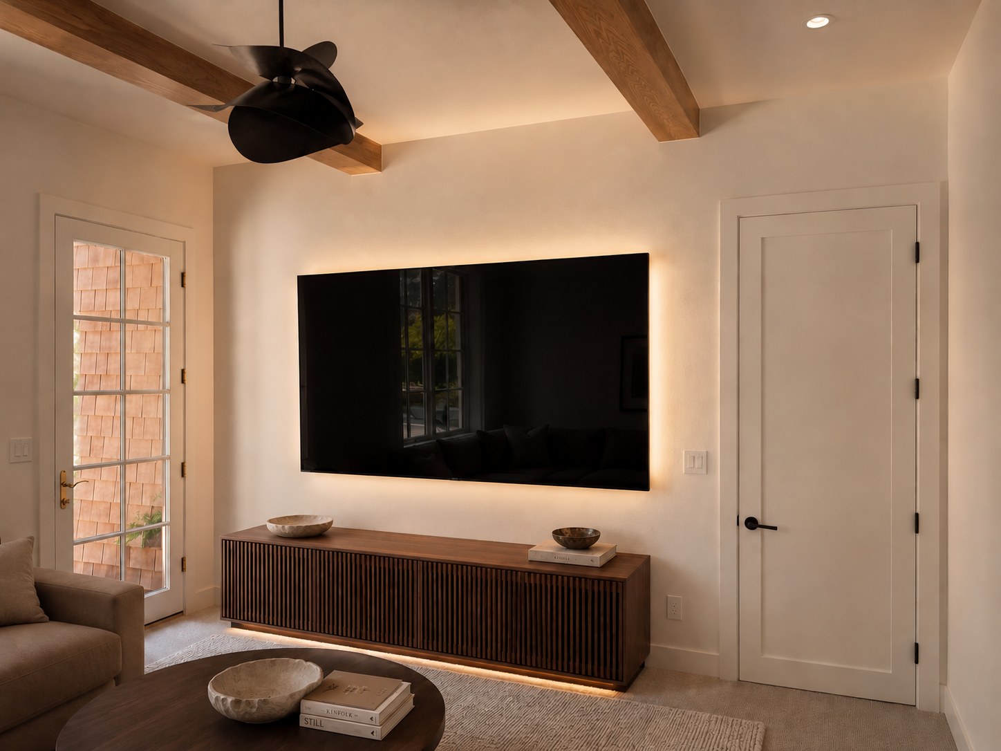 TV sitting room with media console, LED underlighting, white oak ceiling beams, and black ceiling fan — Kreuger Residence, Bend Oregon