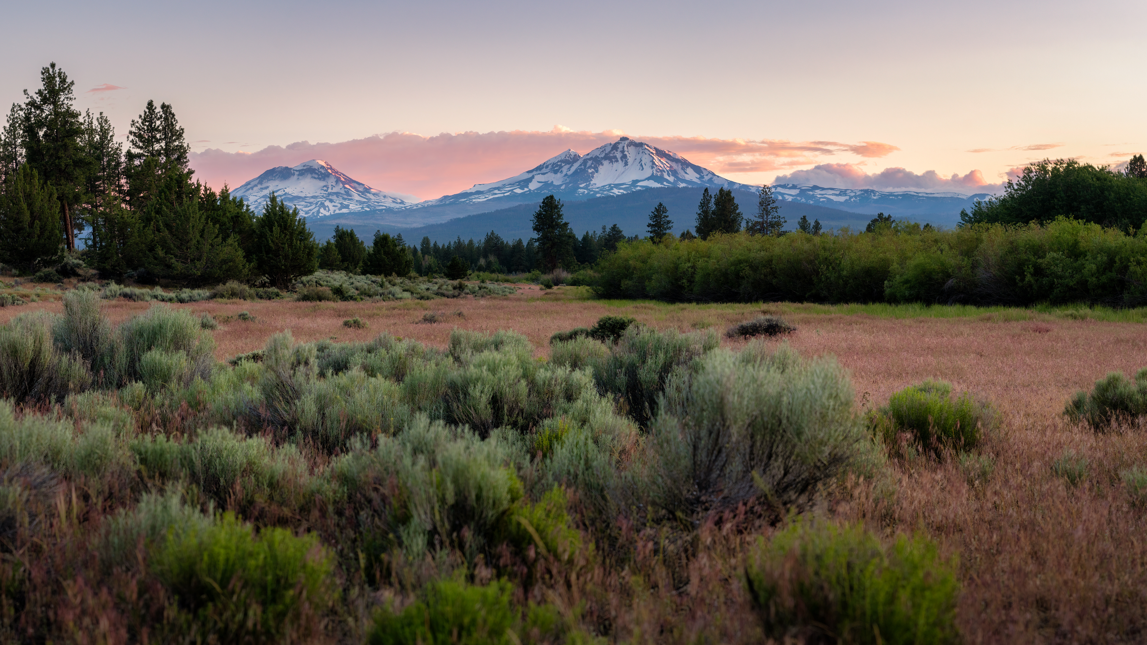 Three Sisters mountains at sunset, Central Oregon — LT Northwest Builders service area